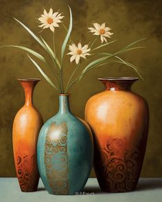 three vases with flowers in them sitting on a table next to each other,