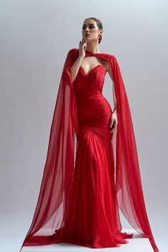 Description Red Mermaid, Long dress Cape shape, Long Sleeves Open neckline Dry Clean Evening Dress Made in EU CA71 Red Dress With Cape, Red Mermaid Gown, Mermaid Long Dress, Dress With Cape, Dress Cape, Red Mermaid, Evening Gowns With Sleeves, Red Christmas Dress, Corset Skirt