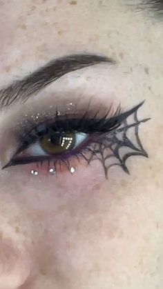 dalya🫐🩹🫧🖤🧿 on Instagram: "webbed🕸️🕸️🕸️ #makeup #halloweenlook #halloween makeup #halloweeneyeliner #halloweenathome #eyelinertutorial #eyeliner #eyelook #spookymakeup #mua #spiderweb #spider #halloween#beauty #gems" Spider Inspo Makeup, Halloween Spider Web Eyeliner, Spider Winged Liner, East Halloween Eyeliner, Spiderwebs Eyeliner, Halloween Spiderweb Makeup, Spider Web Eyeliner Tutorial, Spiderweb Eyeliner Easy, Halloween Eyeliner Spiderweb