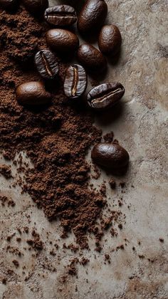 coffee beans and ground coffee on a table