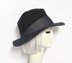 Fedora hat, light weight grey denim with a black cotton twill contrast, 1" cotton band inside, the hat has crown 3 1/2 " in length, lined in a rayon print and a one piece 3" brim. One size fits most up to 23" Machine wash / hand dry Made in USA Whats great is this hat is packable all you need to do is steam or press to look good as new. Felt Fedora, Grey Denim, Dry Hands, Fedora Hat, Cotton Twill, Black Cotton, Fedora, Steam, Made In Usa