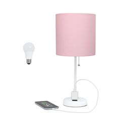 a pink lamp next to a remote control and a lightbulb on a white background