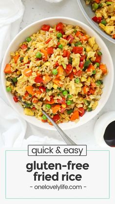 two bowls filled with fried rice and vegetables