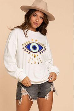 Aztec Mix Match Print On Sweatshirt complete the look with matching evil eye pants FABRIC & FIT: Model is wearing size Small. Evil Eye Sweater, Eye Pants, Eye Sweater, Black Evil Eye, White Evil Eye, One Eye, White Crew Neck, Sweatshirt Fabric, Blue Evil Eye