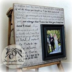 a wooden frame with a wedding poem on it and an image of a bride and groom