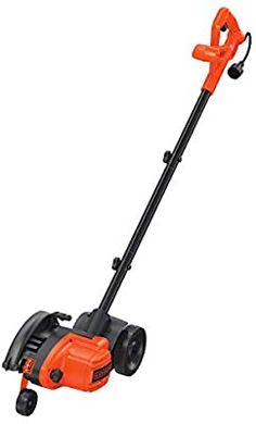 an orange and black electric lawn mower