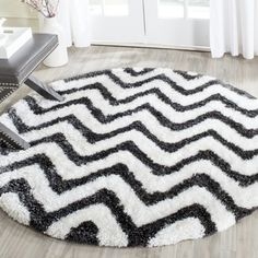 a black and white rug on the floor