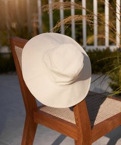 Cotton Canvas Sun Hat Natural This easily packable hat will keep your complexion protected through the sunniest of days. 100% canvas with cotton canvas lining. Made in China. | Jenni Kayne Women's Cotton Canvas Sun Hat Size Medium/Large Adjustable Cotton Bucket Hat With Uv Protection, White Cotton Summer Sun Hat, Summer Brimmed Cotton Hats, Summer Wide Brim Cotton Hat, Summer Cotton Bucket Hat With Uv Protection, Cotton Bucket Hat With Uv Protection For Vacation, Beach Canvas Wide Brim Bucket Hat, Lightweight Cotton Summer Sun Hat, Casual Canvas Sun Hat For The Beach