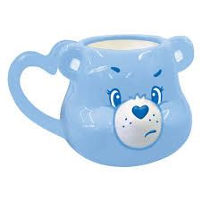 a blue mug with a bear face on it