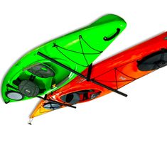 two kayaks are shown side by side on a white background, one is green and the other is red