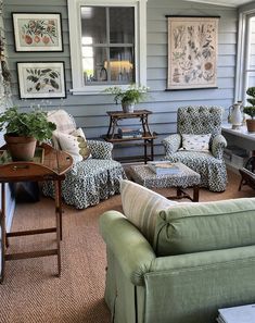 a living room filled with lots of furniture