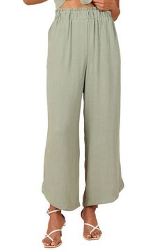 Easy and polished, these elastic-waist pants are crafted from lightweight linen with flowy wide legs. Elastic waist Side pockets Unlined 100% linen Hand wash, dry flat Imported Spring Linen Pull-on Bottoms, Spring Linen Pull-on Pants, Spring Linen Pants With Pull-on Style, Spring Linen Wide Leg Pants With Pull-on Style, Relaxed Wide Leg Pants With Pull-on Style For Spring, Chic Linen Wide Leg Pants With Pull-on Style, Linen Wide-leg Pull-on Bottoms, Linen Wide Leg Bottoms With Pull-on Style, Linen Wide-leg Pants With Pull-on Style