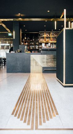 an image of a long wooden floor in a restaurant