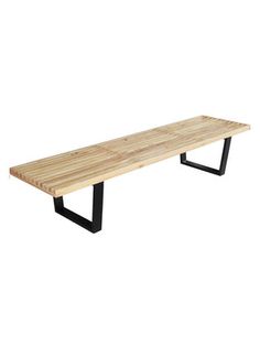 a wooden bench sitting on top of a black metal frame legs and wood planks