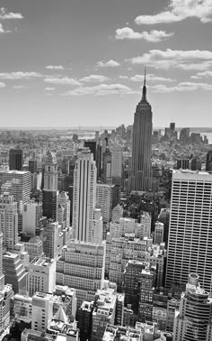 black and white photograph of new york city from the top of the empire state building