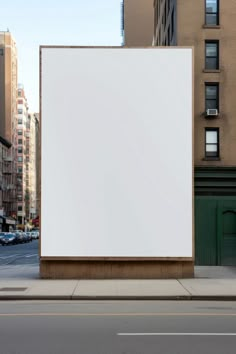 an empty billboard on the side of a city street