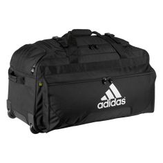 adidas Team Wheel Bag. Get your gear where it needs to be quickly and effortlessly with adidas' Team Wheel Bag. Durable duffle with easy-roll wheels, a telescoping padded handle, supportive compression straps and padded handles on top and bottom to make traveling a breeze. The adidas Team Wheel Bag has a large main compartment with an inner zippered pocket and two side pockets. FreshPAK technology keeps odor at bay. 600D polyester. 30" x 15" x 14.5". Tennis Outfit Women, Tennis Bags, Gym Backpack, Tennis Bag, Adidas Bags, Adidas Tennis, Team Bags, Team Training, Workout Bags