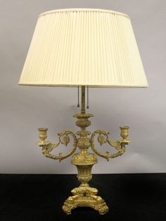 Fantastic quality bronze lamp entirely chiseled with berries and flowers, two C scrolled arms extend with winged griffins and candle holders, the bottom with three large paws standing on a decorated triangle shaped base. Bronze Lamp, Empire Style, Triangle Shape, Beautiful Things, Chandeliers, Lamp Shade