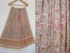 "ITEM DESCRIPTION golden pink flower printed cotton long maxi skirts - ethnic wear bohemian look maxi skirts Material: 100% cotton voile soft crinkled fabric Length: - 38 inch long Waist :-28.00 inch full (14 inch half) 28 inch relaxed can stretch up to 50 inch Size: free size (fit to all) PRODUCT NAME: - Long Women Maxi skirts Ladies Vintage Long skirts Company Return Policy: Please write for more information to my email directly CHOOSE \"ASK SELLER QUESTION \" payment policy:- we accepts payme Bohemian Pink Floral Print Maxi Skirt, Bohemian Maxi Length Pink Skirt, Bohemian Pink Maxi Skirt, Traditional Pink Skirt For Summer, Traditional Pink Summer Skirt, Bohemian Cotton Pink Skirt, Bohemian Pink Cotton Skirt, Traditional Pink Skirt For Spring, Pink Bohemian Cotton Skirt