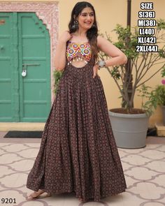 Latest Designer Cotton Printed Kutchi Gamthi Kodi Work Long Anarkali Navratri Gown Collection 2024, Ready To Wear Indian Garba Gown Dress Fabric - Cotton Lining (Inner) - Cotton (Full Up to Bottom) . Type - Readymade Size - S(36), M(38), L(40), XL(42), XXL(44) Work - Printed, Kutchi Gamthi Work And Kodi Lace Length - 56 Inch Flair - 4 Meter Weight - 1 Kg Occasion - Navratri Festival 𝐒𝐞𝐫𝐯𝐢𝐜𝐞𝐬 * Stitching Service Is Available On Customer Demand. Please Get In Touch With Us For Stitching Service. * Beware Of Fake Sellers. We Are Giving Assured Quality. Our Strong Quality Check System Has A 0% Defect Rate. So You Will Always Receive An Excellent Product. * We Also Take Bulk Orders For Weddings And Other Occasions * We Customize Everything When It Comes To Ethnic Wear. * We Also Make Pl Latest Navratri Collection 2024, Navratri Gown, Gamthi Work, Gowns Online Shopping, Garba Dress, Navratri Collection, Navratri Dress, Navratri Festival, Long Anarkali