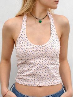 Description Material Polyester Style Leisure Fit Type Slim Sleeve length Sleeveless Pattern Type Printing & Dyeing Color Pink Collar type Halter Weight 0.1kg Length Short Season Summer Size S.M.L Size & Fit Size Guide (unit：cm) Size Bust Length S 72-82 35 M 76-86 36 L 80-90 37 Note: The size may have 1-3cm differs to manual measurement please note when you mearsure. Free Return & Exchange FREE RETURNS on all US orders! The following conditions must be met: 1. Items must be returned within 45 day