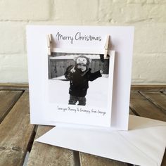 a christmas card with an image of a little boy