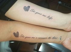 two people with matching tattoos on their arms that say, so you're not a reason to love