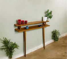 Placed above the radiator in your living room, hallway; The stunning slim reclaimed wood console table is perfect for any room in your home. Dimensions: ---------------- Leg Height: 29.5" (75cm) Legs Width: 7.9" İnc ( 20 cm ) Length: 15.7" ( 40 cm ) - 78.7" ( 200 cm ) Thickness: 18mm Pitch: 4" ( 10 cm ) Please contact us for the special size and colors you want. Would you like a different size? We can do this. We can make all our products in any size you want. The product is very easy to install. It offers different usage areas thanks to its segmented structure. You can put whatever you want in it. This slim wooden console is perfect anywhere in your home, in your living room, hallway, above the radiator or even as a backrest. It will look perfect at the entrance of your home, behind your Console Tables Slim, Narrow Tall Console Table Entryway, Narrow Entry Table Brass, Narrow Entryway Tables Wood, Narrow Entry Table Bohemian, Small Hall Table 2 Legs, Narrow Console Table Behind Bed, Minmalist Narrow Console Table, Slimline Hall Table