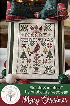 a cross stitch christmas card with the words, simple sampleers by anabella's needle