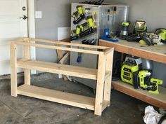 two work benches with tools on them in a garage