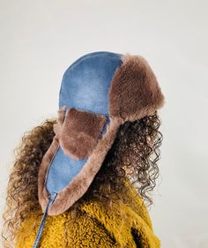 Our aviator hats are made of first quality sheepskin and fur. It is suitable for every style of dressing. Hats have a leather strap that snaps ear flaps under your chin. All of our products are handmade  Gloves that you can combine in similar styles are available on our page. Please contact us if you have any questions. Shearling Hat With Faux Fur Lining And Ear Flaps, Sheepskin Hat With Faux Fur Lining And Ear Flaps, Sheepskin Hats With Ear Flaps For Outdoor, Sheepskin Outdoor Hat With Ear Flaps, Winter Sheepskin Hats With Plush Lining, Trapper Hat Men, Winter Hat Women, Aviator Cap, Women Winter Hat