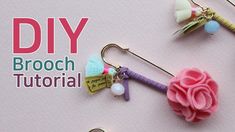 the diy brooch earrings are made with fabric flowers and pearls on hooks,