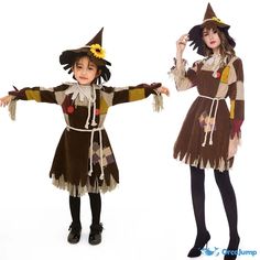 two children dressed up in halloween costumes, one wearing a witch hat and the other as a scarecrow