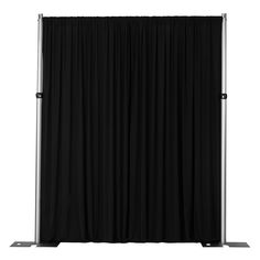 a black curtain with metal poles on the side