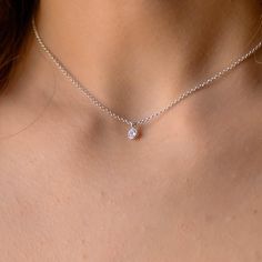 This dainty tiny Cubic Zirconia pendant necklace has a delicate chain and a minimalist style. It is so elegant and can be layered with other necklaces. The chain is solid sterling silver 925., and there is an extension so that the size can be adjusted. If you would like a custom order or have any questions please contact me, thanks. Cz Necklace, Pretty Necklaces, Cz Pendant, Delicate Chain, Necklaces For Women, Pendant Silver, Silver Pendant Necklace, Minimalist Style, Necklace For Women