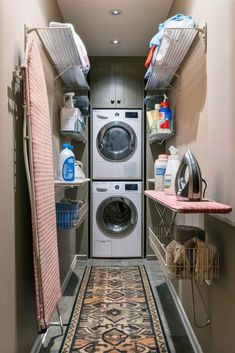 a washer and dryer in a small room