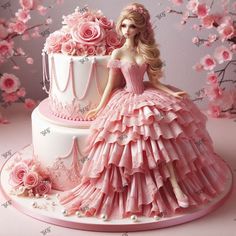 a barbie doll sitting on top of a pink cake with flowers in the foreground