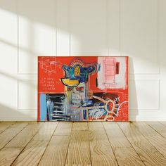 an abstract painting is shown on the wall next to a wooden floor in front of a white paneled wall