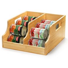 six cans of canned food in a wooden holder