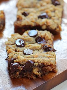 chocolate chip cookie bars sitting on top of a piece of paper