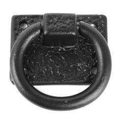 an old black metal ring on a white background