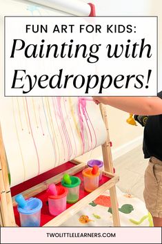 a young boy painting with watercolors on an easel and the text fun art for kids painting with eyedropers