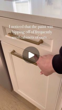 a person opening a cabinet door with the words i noticed that the paint was chipping off of frequently used cabinets of ourss