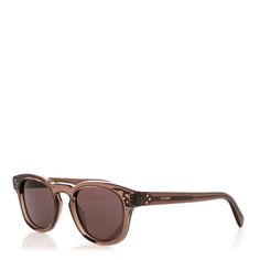 This is an authentic pair of CELINE Acetate Sunglasses CL402331 in Brown. These stylish sunglasses have angular oval rims in clear brown and feature brown lenses. Acetate Sunglasses, Stylish Sunglasses, Lenses, Sunglasses