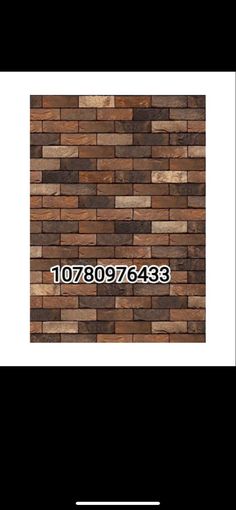 a brick wall with numbers on it and a white frame in the middle that says,