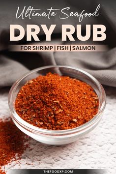 the ultimate seafood dry rub for shrimp, fish and salmon seasoning in a glass bowl