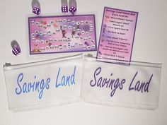 three clear plastic bags with purple and white dices on the front, two saying savings land and one saying savings land