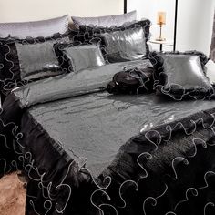 black and silver bedding with hearts on it