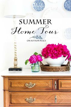 a dresser with flowers and vases on top of it in front of a wall that says summer home tour