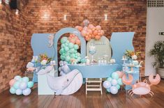 an ocean themed birthday party with balloons and decorations